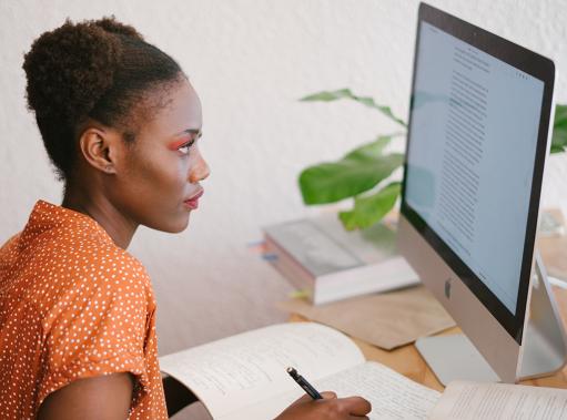 woman looking at computer